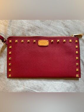 Michael Kors Selma Studded Large Wristlet in Red Saffiano Leather.